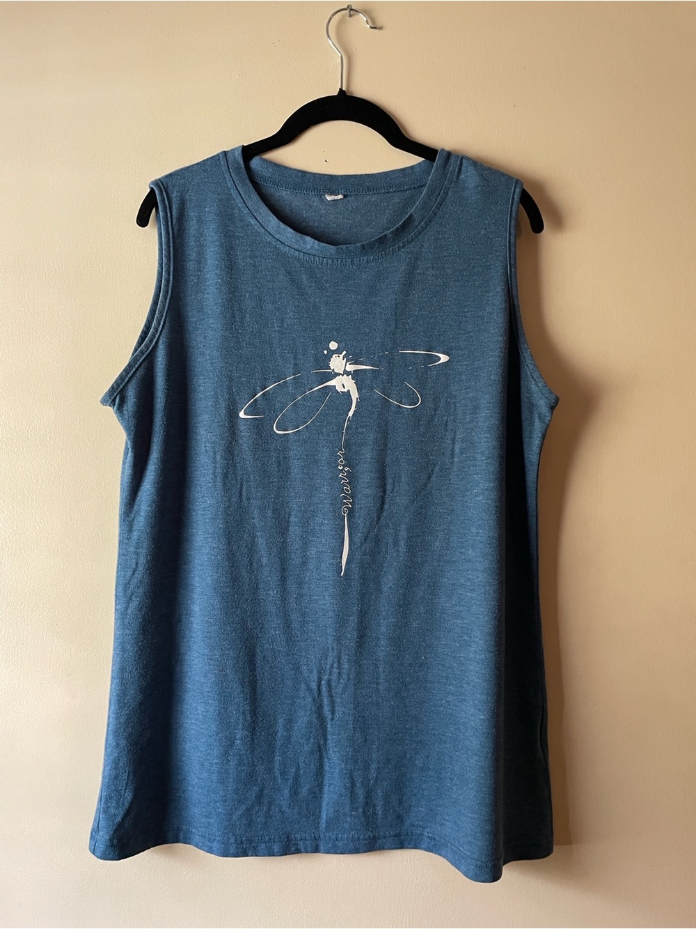 Blue Sleeveless Top with Dragonfly Design